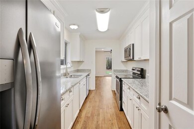 Enter kitchen from either dining room or breakfast