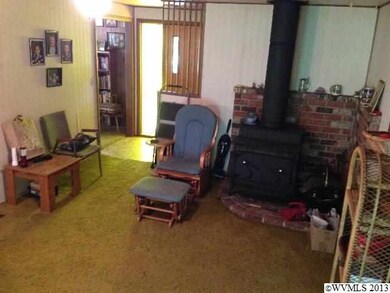 Includes woodstove.