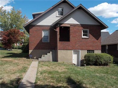 Exterior Back. The rear kitchen steps may need a r