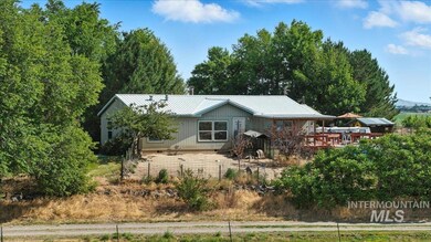View of front of home featuring a metal roof