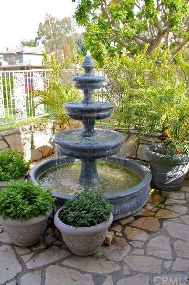Tiered fountain and flagstone patio in the courtya