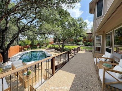View of pool featuring a fenced backyard and a pa