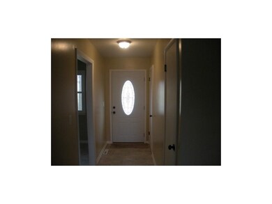 Inviting entryway with a coat closet!