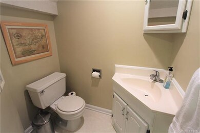 Nice private powder room on main level.