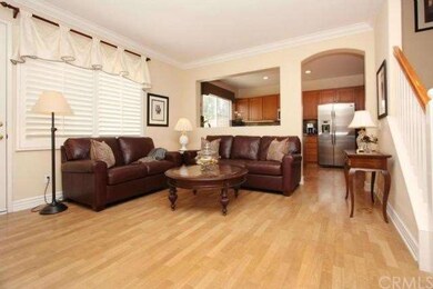 Family room opens to Kitchen.