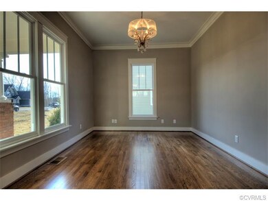 This flexible room flanks the foyer on opposite si