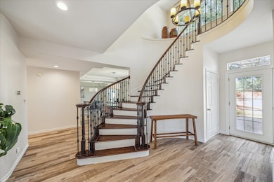 HARDWOOD STEPS WITH WHITE RISERS LOOK ELEGANT WITH