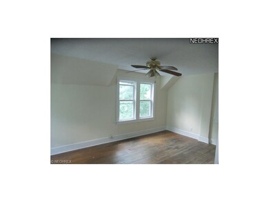 Bedroom 1 features wood floors, windows for natura