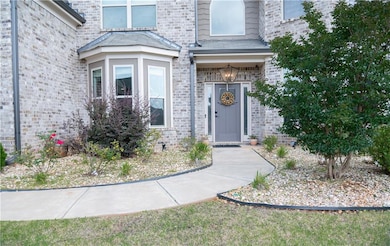 Property entrance with brick siding