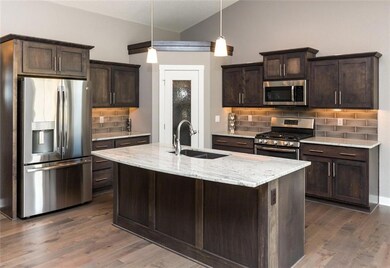 Kitchen with walk in pantry.