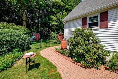Well landscaped walkway to back...