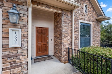 13904 Ashton Woods Cir unit 24, Austin, TX 78727 - photo 2