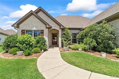 Curved sidewalk extends from the driveway right up