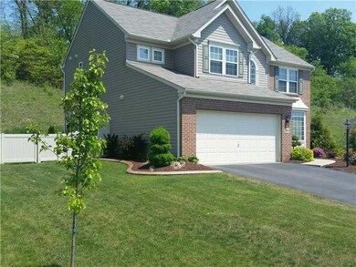 Exterior Front. Professionally landscaped.