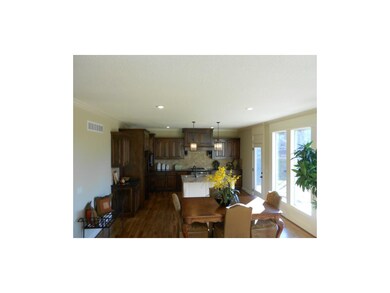 Open Kitchen & Light & Bright Breakfast Room.