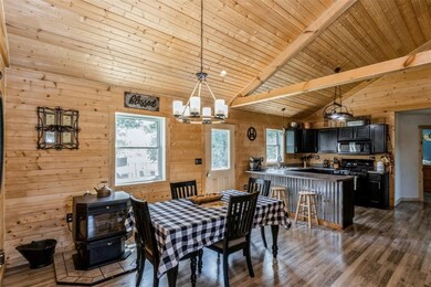 Dining, Kitchen, pellet stove and rear door