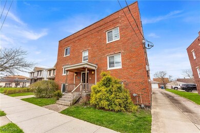 View of front of house with brick siding