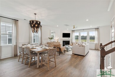 Dining and Family Room. *Model home photography is