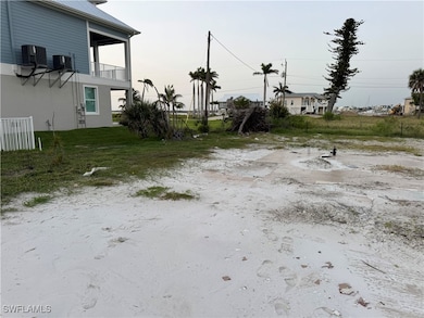 View of yard featuring a balcony