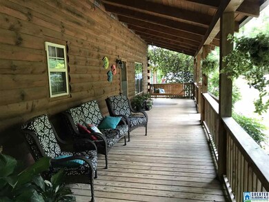 Relax after a hard day on this shady front porch.