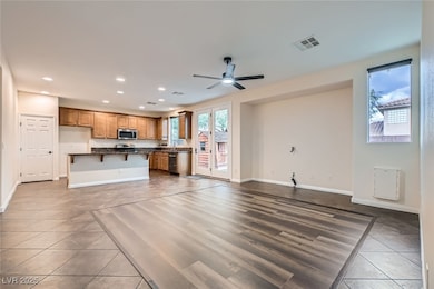 Unfurnished living room with recessed lighting, a