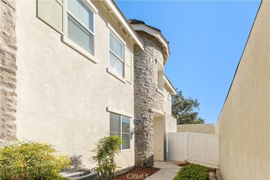 Enchanting French Tudor Style townhome is move-in ready, centrally located, and has a private end unit location.