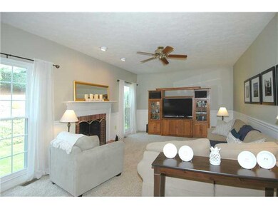 Den/Family/Great Room. Graceful family room featur