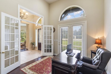 Office area featuring french doors, plenty of nat