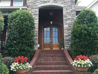 Very Impressive Front Entrance with arched Stoned 