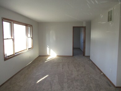 Large living room with new carpet