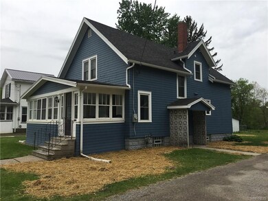 Driveway side.  New grass seed planted