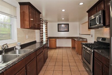 Additional counterspace and cabinets.