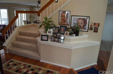 As you entry you have view of living area with sta
