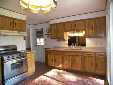 Kitchen. Bright, sunny kitchen with sliders to the