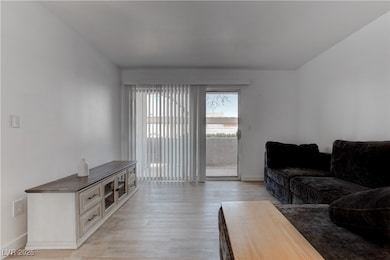 Living room featuring light wood finished floors a