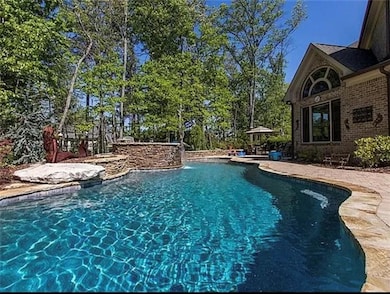 Outdoor pool featuring a patio area