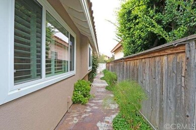 Newer windows throughout.  Meticulously maintained side yards.