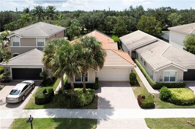 WIDE SIDEWALKS & PAVERED DRIVEWAY