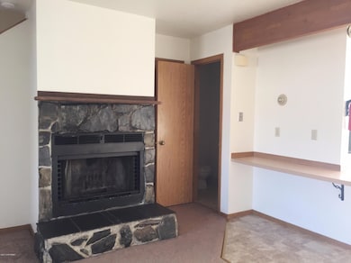 Living room & entry to half bath