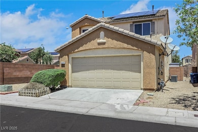View of front of house with concrete driveway, a g