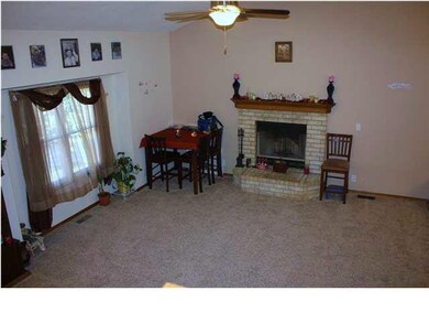 LIVING ROOM WITH HUGE PICTURE WINDOW WITH CARPET L