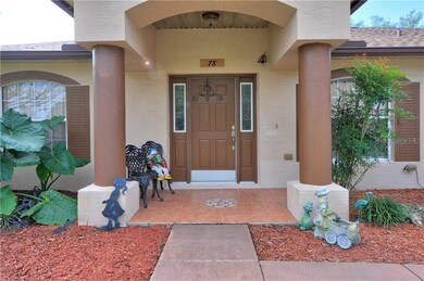 Covered front porch with beautiful tile