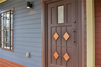 The decorative front door is just one of the custom features.