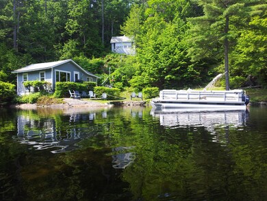 camp, bunkhouse and boat