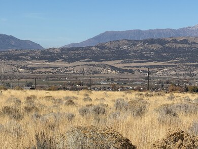 View of mountain background featuring rural landscape