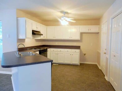 Spacious Kitchen with Tile Flooring, Gas Cook Top, Dishwasher and Pantry