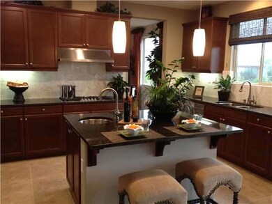 Kitchen pictured is of model home with the same fl