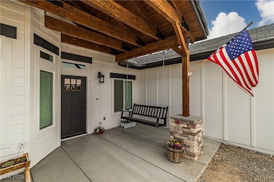 View of patio featuring a porch