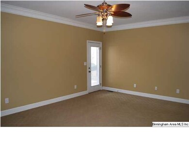 Master Bedroom with crown molding, lighted ceiling