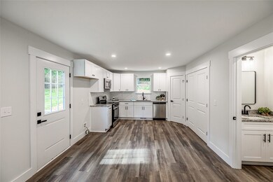 Unstaged Living Room & Kitchen